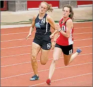  ?? Arkansas Democrat-Gazette/THOMAS METTHE ?? Maumelle’s Claire Luallen (right) runs past Springdale Har-Ber’s Kenna Ebert as they come out of a turn Wednesday during the 200-meter competitio­n at the state high school heptathlon in Cabot.