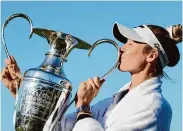  ?? Andy Lyons/Getty Images ?? Nelly Korda etched her name in the LPGA record books by winning her record-tying fifth straight title.