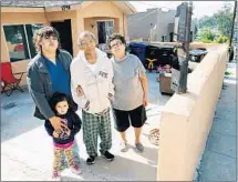  ?? Christina House For The Times ?? THE SANCHEZ FAMILY at home in Echo Park. They are being evicted after living in the neighborho­od for 32 years.