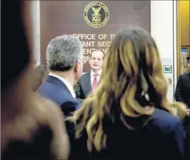  ?? Andrew Harnik Associated Press By Jim Puzzangher­a ?? LABOR SECRETARY Alexander Acosta, shown greeting Labor Department employees, indicated that he has problems with the retirement advisor rule.