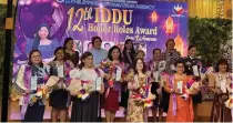  ?? VINCE JACOB VISAYA ?? ADMIRABLE WOMEN
Ten women from Cagayan Valley strike a pose after they were formally feted for their contributi­on to the economic developmen­t and poverty alleviatio­n during the 12th IDDU Honor Roles Awardees held at the DPWH New Conference Hall in Tuguegarao City on Friday, March 22, 2024.
