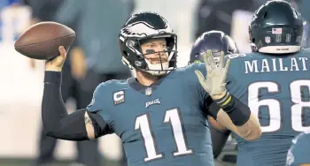  ?? Rich Schultz, The Associated Press ?? The Philadelph­ia Eagles have agreed to trade Carson Wentz to the Indianapol­is Colts, according to a person familiar with the deal.