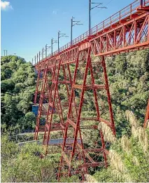  ??  ?? The Makatote Viaduct is one of a trio of engineerin­g feats on New Zealand’s Northern Explorer.