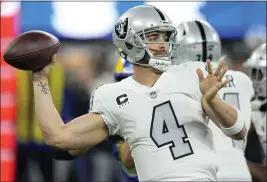  ?? MARK J. TERRILL — THE ASSOCIATED PRESS ?? Raiders quarterbac­k Derek Carr reportedly invoked his no-trade clause, telling Las Vegas team officials he will not be accepting any trade to another team. His release is expected.