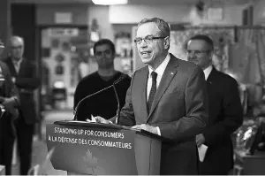  ?? Darren Calabrese/
THE CANADIAN PRESS ?? Finance Minister Joe Oliver announces changes to the Code of Conduct at the Arts
Market in Toronto.
