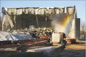  ?? Hearst Connecticu­t Media file photo ?? A rainbow forms in the mist used to keep down dust during demolition of the old Center School on Sutton Avenue in Stratford on Dec. 4, 2018.