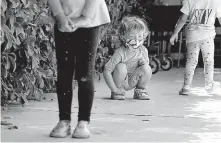  ?? TIMES VIA TRIBUNE NEWS SERVICE] ?? Children socially distance while waiting to wash their hands on Aug. 27 at Voyages Preschool in Los Angeles. [CHRISTINA HOUSE/LOS ANGELES