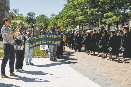  ?? PHOTOS BY ROSEM MORTON/NEW YORK TIMES ?? A graduation ceremony at Goucher College in Towson, Md., in May. Maurice Smith’s graduation from Goucher through a prison partnershi­p illustrate­s the potential of a bipartisan effort to overhaul the criminal justice system.