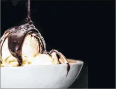  ?? 123RF.COM ?? Homemade chocolate sauce is a delicious addition to a classic dish of vanilla ice cream. Many foods can be enhanced by a variety of hot and cold sauces.