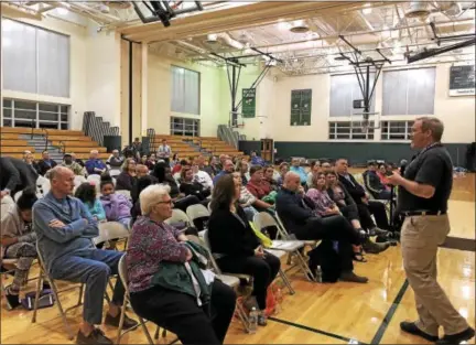  ?? NICHOLAS BUONANNO — NBUONANNO@TROYRECORD.COM ?? Dr. Michael Dailey of Albany Medical Center speaks to community members in Green Island Wednesday during a heroin awareness town hall meeting.