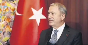  ?? ?? Defense Minister Hulusi Akar addresses reporters, Munich, Germany, Feb. 20, 2022.