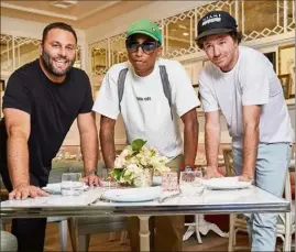  ?? (Photo D. R.) ?? De g. à d. : en compagnie de Dave Grutman, Pharrell Williams et Jean Imbert dans leur restaurant à Miami : Swan.