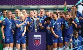  ?? Photograph: Chris Lee/Chelsea FC/Getty Images ?? Millie Bright and Magdalena Eriksson of Chelsea lift the Women’s Super League trophy after being crowned champions.
