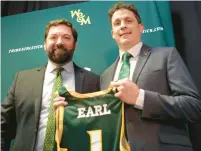  ?? STEPHEN M. KATZ/STAFF ?? William & Mary director of athletics Brian Mann, left, welcomes Brian Earl as the school’s new men’s basketball coach during a press conference Wednesday.