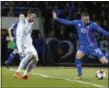  ?? ASSOCIATED PRESS FILE ?? Iceland’s Gylfi Sigurdsson, right, shoots against Kosovo during a World Cup qualifier Oct. 9, 2017, in Reykjavik.