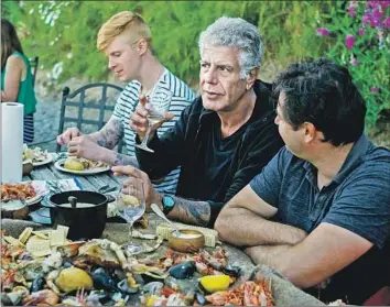  ?? David Scott Holloway CNN ?? ANTHONY BOURDAIN dines on Vashon Island near Seattle last year while filming “Parts Unknown.”