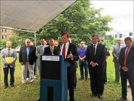  ?? PHOTOS BY NICHOLAS BUONANNO— NBUONANNO@TROYRECORD.COM ?? New York state Department of Transporta­tion Commission­er Matthew Driscoll, announces state and federal funding to redesign Route 787 in the city as a true boulevard to improve pedestrian safety during a Monday morning news conference near the...