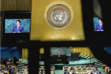  ??  ?? Abe addresses the 73rd session of the United Nations General Assembly at the UN headquarte­rs in New York, US. — Reuters photo