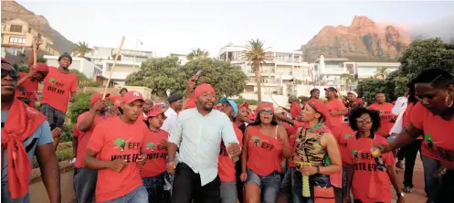  ?? NDAMANE African News Agency (ANA) AYANDA ?? EFF members protest at Clifton and Camps Bay beaches yesterday amid controvers­y that a private security company allegedly sent visitors away after sunset over the festive season. |