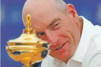  ?? FRANCOIS MORI/ASSOCIATED PRESS ?? USA Captain Jim Furyk looks at his European counterpar­t Thomas Bjorn during a news conference Monday at the Golf National in Guyancourt, outside Paris. The 42nd Ryder Cup matches will take place in France from Friday-Sunday at the Albatros Course of Le Golf National.