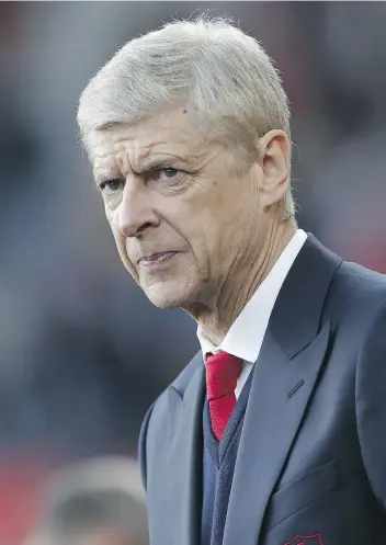  ?? ADRIAN DENNIS/AFP/GETTY IMAGES ?? Arsene Wenger has been under pressure to leave his post at Arsenal, which could finish outside of the top four — and a lucrative Champions League spot — for the first time in his tenure.