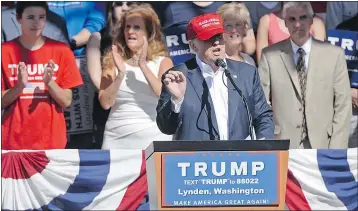  ?? PHILIP A. DWYER/BELLINGHAM HERALD ?? Donald Trump talks to supporters at the Northwest Washington Fair grandstand in Lynden, Wash. on Saturday.