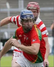  ??  ?? Ben Edwards beats Ferns St. Aidan’s captain Jonny Dwyer in Rapparees’ big Pettitt’s SHC win on Sunday.