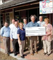  ?? Janelle Jessen/Herald-Leader ?? La-Z-Boy Foundation presented a $3,000 check to the Dogwood Literacy Council on Wednesday. Pictured are LaZ-Boy employees Jeff McGarrah, materials manager; Neil Erter, logistics manager; Rick Wilmoth, controller; Audra Farrell, human resources manager;...