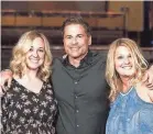  ??  ?? Crystal Patriarche, right, with actor Rob Lowe and her director of marketing, gets to “make people’s dreams come true.”