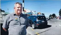  ?? Photo: NATASHA MARTIN/FAIRFAX NZ ?? Careful driving: South Canterbury road safety co-ordinator Daniel Naude keeps an eye on traffic at the Otipua Rd-church St intersecti­on as drivers face their first weekday with the new give way rules.
