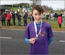  ??  ?? Joe Byrne (SBR) was delighted to medal at the All-Ireland Cross County Championsh­ips in Waterford.