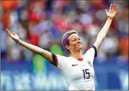  ?? MAJA HITIJ / GETTY IMAGES ?? Team USA’s Megan Rapinoe scored on a penalty kick Sunday and emerged with the Golden Ball as the top player in the Women’s World Cup and the Golden Boot as top scorer.