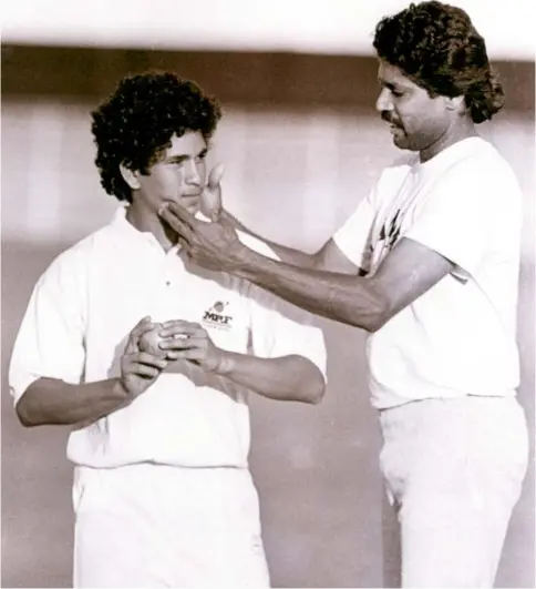  ??  ?? SACHIN GETTING APEPTALK AND APAT ON THE CHEEK FROM KAPIL DEV DURING HIS DEBUT TOUR OFPAKISTAN IN 1989