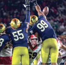  ?? KEN WARD / For the Calhoun Times ?? Georgia’s Trent Frix (69) blocks after snapping on a field goal attempt during Saturday’s game at Notre Dame.