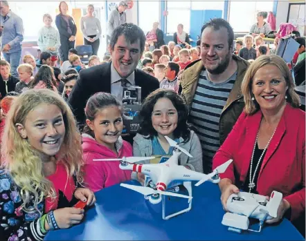  ??  ?? Land Informatio­n’s drone Manu was busy out of Wellington last week but Hutt profession­al photograph­er Brady Dyer, whose drone is kept busy with shooting jobs where getting above a site is necessary, brought in his drone so the Waterloo School year 6...