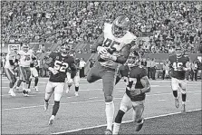  ?? [BILL KOSTROUN/THE ASSOCIATED PRESS] ?? Lions tight end Eric Ebron hauls in a touchdown pass in front of the Giants’ Darian Thompson (27) and Jonathan Casillas (52) during the first half on Monday in East Rutherford, N.J. The game was not over in time for this edition. For the result, see...