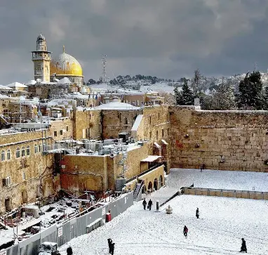  ?? PICTURE: AP ?? HOLY GROUND: The Western Wall, right, and the gilded Dome of the Rock, two of the holiest sites for Jews and Muslims.