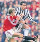  ??  ?? Stephen Glass battles with David Beckham for the Magpies in 1998