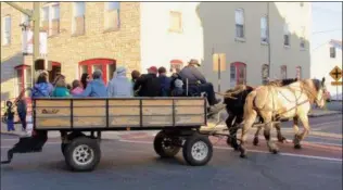  ??  ?? The 7th Annual Christmas in Kutztown on Dec. 1 features Jingle Jam Entertainm­ent, up to 60 vendors in the 200 block of Main Street and free horse drawn wagon rides.