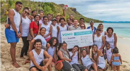  ??  ?? Cure Kids Fiji Events and supporters of children living with Rheumatic Heart Disease during the annual ‘Christmas at Vomo’ in the Mamanuca Islands last week.