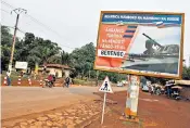  ??  ?? A propaganda billboard in Bangui reads ‘Central African Republic hand in hand with Russia’