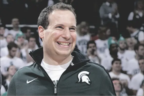  ?? AL GOLDIS/AP ?? FORMER MICHIGAN STATE PLAYER MAT ISHBIA laughs as he is introduced along with Michigan State’s 2000 national championsh­ip team during halftime of the Michigan State-florida game in East Lansing, Mich.
