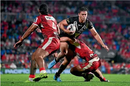  ?? GETTY IMAGES ?? Kiwis fullback Joseph Manu asked plenty of questions of the Tongan defence at Mt Smart Stadium.