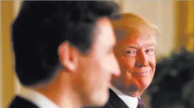  ?? ANDREW HARNIK/ THE ASSOCIATED PRESS ?? President Donald Trump smiles during a joint news conference Monday with Canadian Prime Minister Justin Trudeau in the East Room of the White House. Trudeau noted the “special” bond between the countries, and Trump agreed.