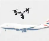  ??  ?? Threat: Drones are banned from being flown within 1km of British airports