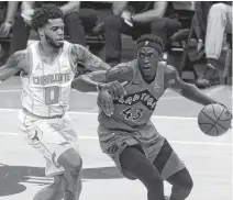  ?? SAM SHARPE • USA TODAY SPORTS ?? Toronto Raptors’ Pascal Siakam moves past Charlotte Hornets’ Miles Bridges during the first half of an NBA pre-season game on Monday.