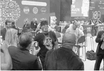  ?? DEWAYNE BEVIL/STAFF ?? Retired wrestler Hulk Hogan makes his way to a press conference Wednesday on the floor of the IAAPA Attraction­s Expo at the Orange County Convention Center.