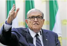  ?? Angela Weiss / AFP / Tribune News Service ?? Federal prosecutor­s reportedly are investigat­ing Rudy Giuliani’s efforts to have former Ambassador Marie Yovanovitc­h recalled in an effort to pressure Ukraine into investigat­ing Joe Biden’s son Hunter.