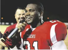  ?? PHOTO/ STEVEN ESPERANZA PHOTO IVP FILE ?? Imperial High Royce Freeman speaks after receiving the CIF-San Diego Section Career rushing record award during a ceremony at the game against Calexico High School in Imperial in 2013. 2013.