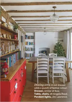  ??  ?? Dining area A red dresser adds a punch of festive colour.Dresser, similar at Ikea.Table, chairs, all Angela Reed.Pendant lights, Jim Lawrence.